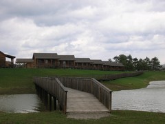 cabins on a lake at Lake Huron Campground